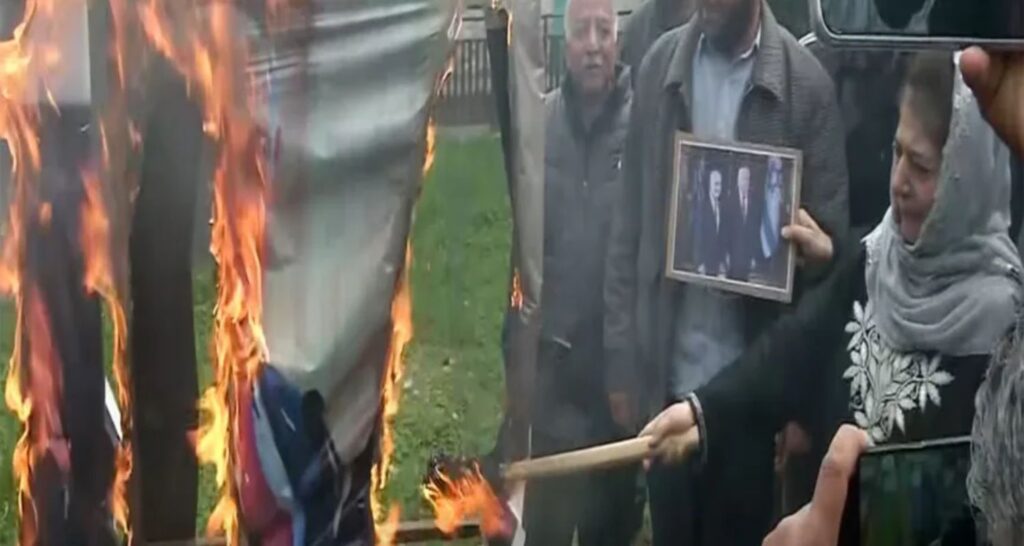 J&K PDP President Mehbooba Mufti burned posters of US President Donald Trump and Israeli Prime Minister Netanyahu on Wednesday, while raising posters of Khamenei to protest the death of the supreme leader during the conflict.