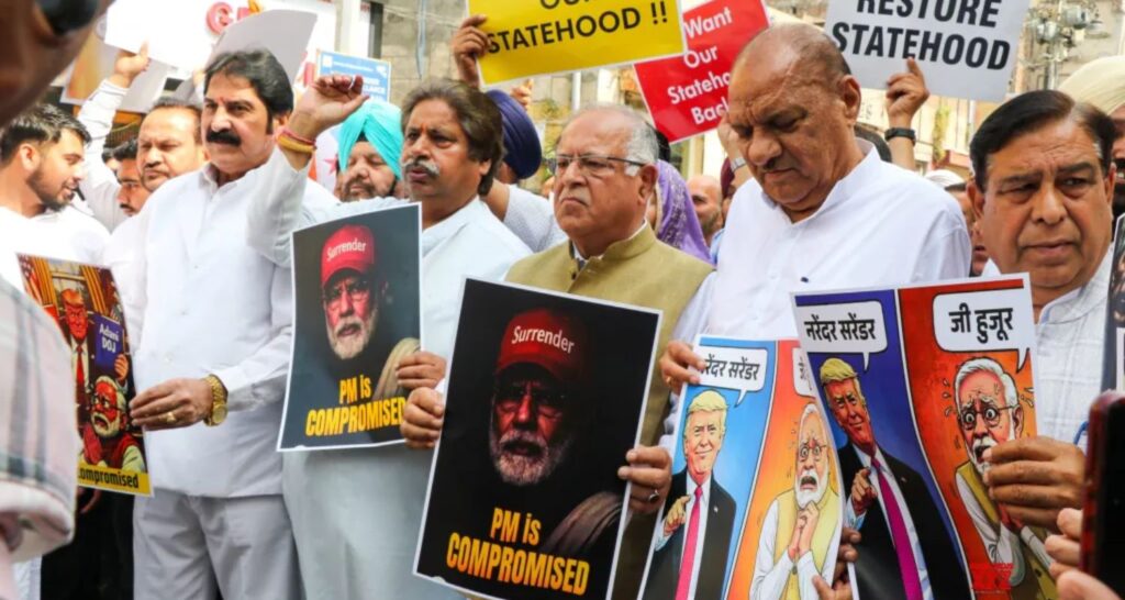 Jammu and Kashmir unit of Congress on Monday staged protests against the BJP-led central government and demanded the resignation of Prime Minister Narendra Modi over the trade deal with the US.The party also demanded restoration of statehood to Jammu and Kashmir.